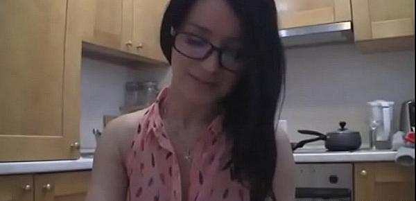  splendid teen with glasses chatting in the kitchen